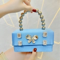 Light blue satin evening bag with rhinestone butterfly and silver beaded handle - Light Blue