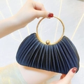 Elegant black pleated evening clutch bag featuring a round gold metal handle and ball clasp - Black