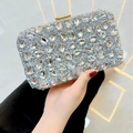 Sparkling silver evening clutch with oversized crystals and golden top clasp - Silver