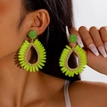 Detail of handmade raffia woven teardrop earrings in neon green and gold for beach vacations - Teardrop Woven (27650) / Fluorescent Green