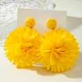 Handmade bright yellow raffia flower earrings in a vibrant layered floral design - Lemon Yellow