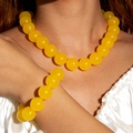 Detailed view of vibrant yellow acrylic beaded necklace and bracelet set on model - Yellow(27326-Set)