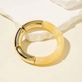 Close-up of marble resin and golden metal tube bracelet showing rich texture and details - Spliced Round Style (29808-G) / Yellow