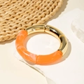 Fashionable acrylic bamboo tube bracelet with orange marble pattern and gold metal accents - Spliced Round Style (29808-G) / Orange