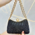 Sparkling black evening clutch bag with rhinestones and pearl clasp handle - Black