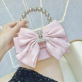 Borsa da sera in raso rosa con fiocco grande, ciondolo a coniglio e manico perlato - Rosa
