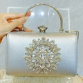 Elegante borsa da sera argento con motivo floreale in strass e manico in metallo - Argento
