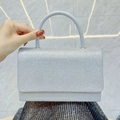 Bolso de noche plateado con purpurina, acabado de lentejuelas y asa curva elegante - Plateado