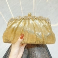Elegant gold sequin clutch bag with pleated design and rhinestone floral clasp - Gold