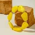 Bracciale bohémien con perline acriliche gialle irregolari e distanziatori - Giallo