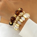 Chunky acrylic bead bracelet set in amber, cream, and marble white with gold metal accents - Amber/White/Gold Stacking Multi-Layer Bracelet (31620)