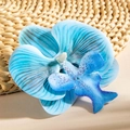 Close-up of blue phalaenopsis orchid hair pin with realistic fabric petal textures - Blue Style (29517-1)