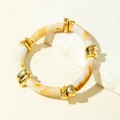 Exaggerated acrylic beaded bracelet with marble texture and golden metal spacers - Marble Pattern Tubular Beaded Bangle (31602)
