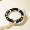 Fashion acrylic bangle with black and white marble pattern and gold metal accents - Black and White Ink Pattern Tubular Bangle (29808)
