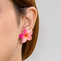 Pink and orange gradient frangipani flower stud earring worn on model's ear - Pink-Orange Gradient