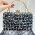 Luxe evening clutch bag with black gemstones, gold handle and diamond buckle clasp - Black