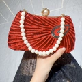 Elegant red sequin evening bag with signature pearl handle and top pearl clasp - Red