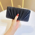 Detail of black pleated evening clutch bag with an elegant golden knot metal clasp - Black Standard No Chain