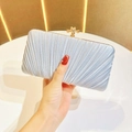 Detail of silver pleated satin evening clutch with elegant gold knotted metal clasp - Silver Standard No Chain