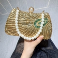 Luxurious gold sequin evening clutch bag with pearl handle and green beaded detail - Gold