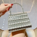 Elegant silver evening bag with sparkling rhinestones and rows of white pearls - Gold