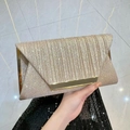 Champagne gold evening clutch with sequins, V-shaped flap and elegant pleated design - Champagne