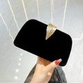 Black velvet clutch evening bag with an elegant golden leaf metal clasp detail - Velvet Fabric / Black