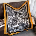 Detailed view of Toile de Jouy jungle animal print scarf with orange contrast border - Bright Orange Yellow