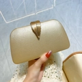 Golden evening clutch bag with leaf clasp and textured finish for wedding guest - Matte Metallic Texture / Gold