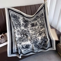 Detail of large square scarf with black and white Toile de Jouy animal print on leather - Black & White