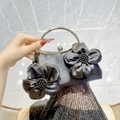 Dark grey shimmering evening handbag featuring large 3D fabric flowers and silver handles - Black