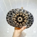 Vintage evening clutch with black rhinestones and large central gemstone detail - Black