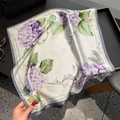 Close-up of silk square scarf featuring realistic purple hydrangea and green leaf prints - Purple