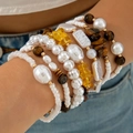 Close-up of stacked beaded bracelets with white pearls, tiger eye stones, and gold accents - Bohemian Tiger Eye Pearl Multilayer Chain (30929-bra-white-EP)