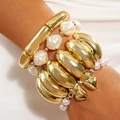 Gold liquid metal cuff and irregular pearl bead bracelet set with bow charm detail - Gold Polished Tube Pearl Bow Set (30323-bra-G)