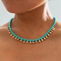 Bohemian beaded choker featuring sky blue beads and golden teardrop charms on a model - Sky Blue (29892-green)