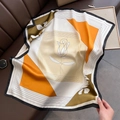 French style floral silk scarf with geometric blocks in orange and olive on leather base - Orange