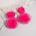 Rose pink fabric flower earrings in satin and organza styles on a white textured mat - Rose Red