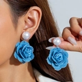 Blue denim rose flower earrings with white pearl studs on model for casual retro style - Denim Pearl Style