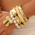 Layered gold metal bracelet set with large bow pendant and pearl beaded chains - Bowknot Pearl Combination Bracelet (30234-bra-G)