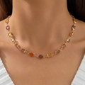 Detail of multi-colored rectangular crystals set in gold-plated link chain on model - Gold Multicolor Rectangular Gem (28772-nek-colour-8-2)
