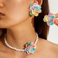 Detail of colorful resin flower jewelry set with pearl necklace and matching earrings - Rainbow 3-Piece Set with Ring (27720-EN-cor-set)