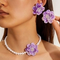 Detail of purple flower jewelry set with pearl necklace and matching stud earrings - Purple Flower Set (27720-EN-purple-set)
