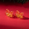 Detail of Christmas stud earrings featuring red bows and golden bells on a festive background - Red Bow Bell Style (30476-ear-rr-5)