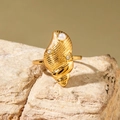 Elegant gold shell ring with central white pearl and sparkling crystals on stone base - Shell Pearl Zirconia Ring (30419-ring-2)