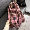 Pink and brown plaid cashmere scarf with long tassels displayed on a grey leather bench - 63*200CM / Raspberry Pink