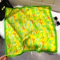 Square silk scarf with green border and abstract yellow floral print on plush mat - Grass Green (Abstract Floral)