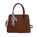 Deep brown bucket bag with lychee texture leather and decorative silk scarf detail - Brown