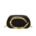 Black woven leather clutch bag with artistic gold oval handle and chain strap - Black