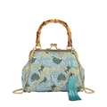 Elegant light blue brocade handbag with bamboo handle, crane patterns, and gold chain - Blue (Crane Pattern)